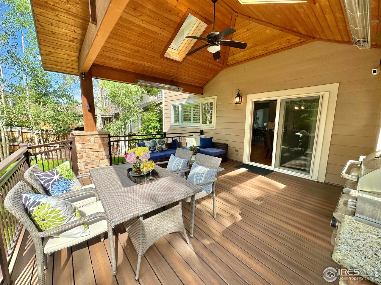 1069 Monarch Way Superior, CO 80027 - Photo 3 of 40 a view of a dining room with furniture window and outside view