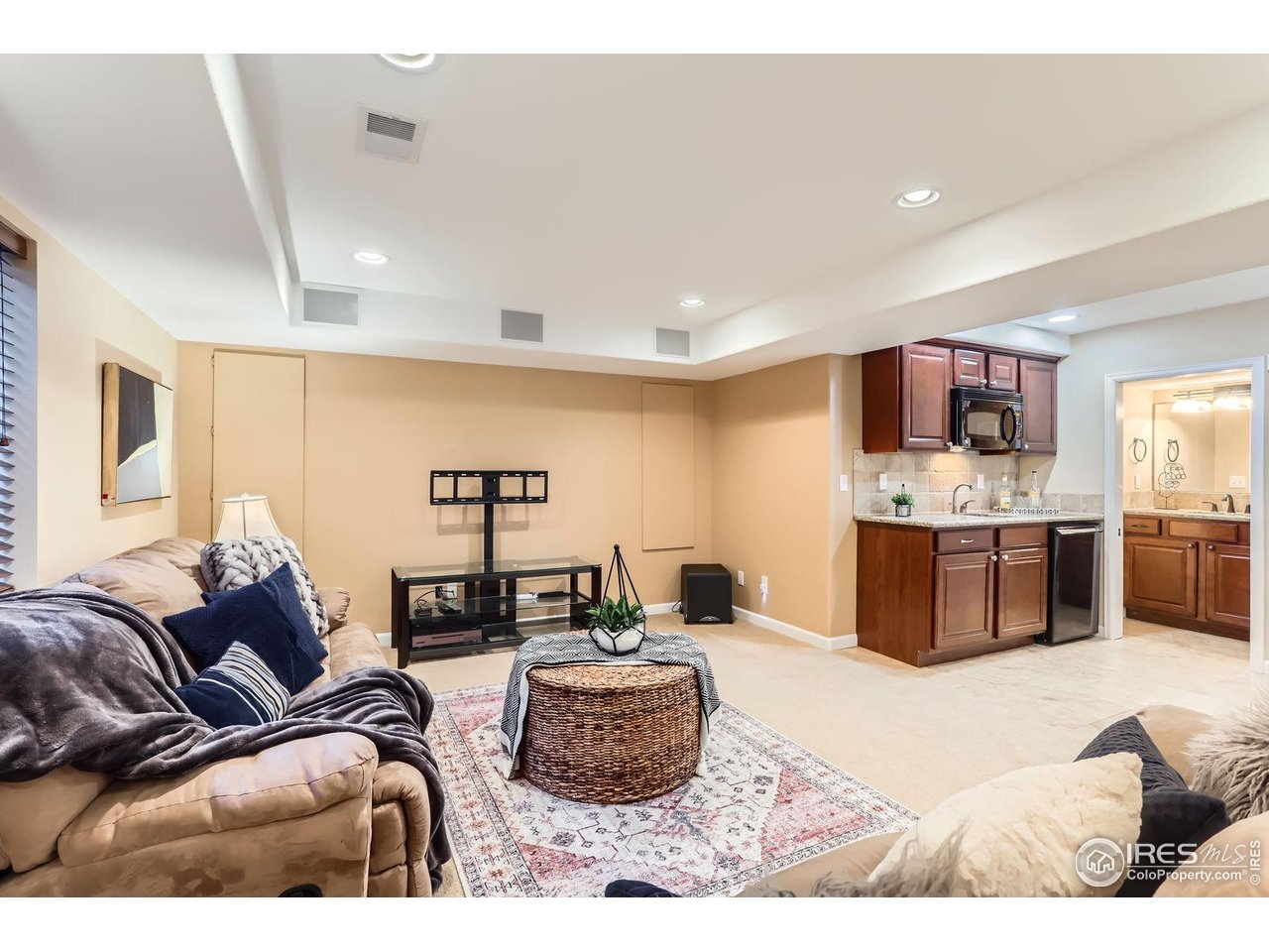 1069 Monarch Way Superior, CO 80027 - Photo 31 of 40 a living room with furniture and kitchen view