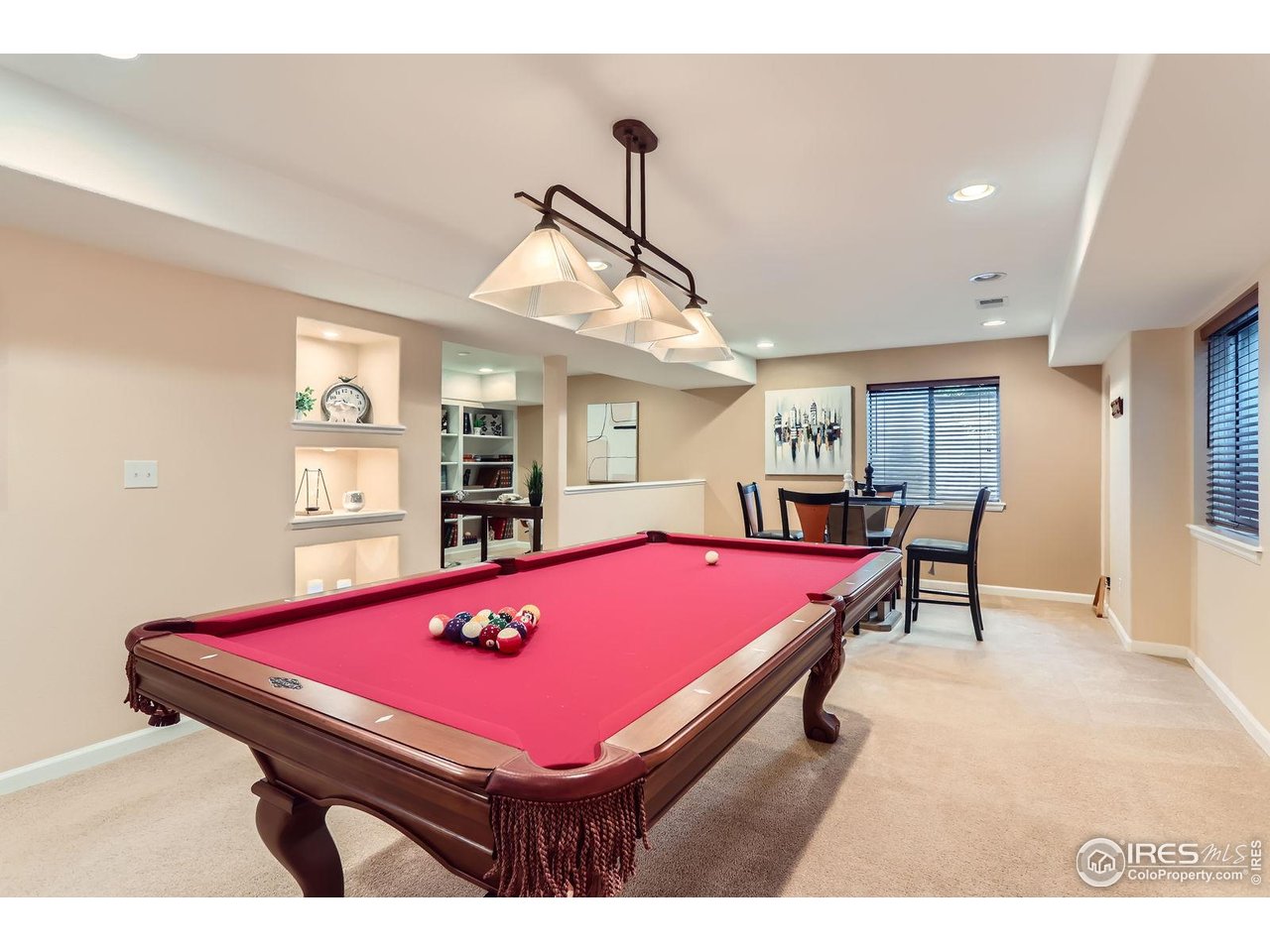 1069 Monarch Way Superior, CO 80027 - Photo 32 of 40 a room with pool table and flat screen tv