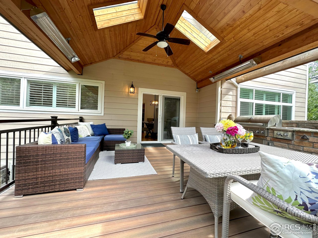 1069 Monarch Way Superior, CO 80027 - Photo 35 of 40 a view of a dining room and livingroom with furniture