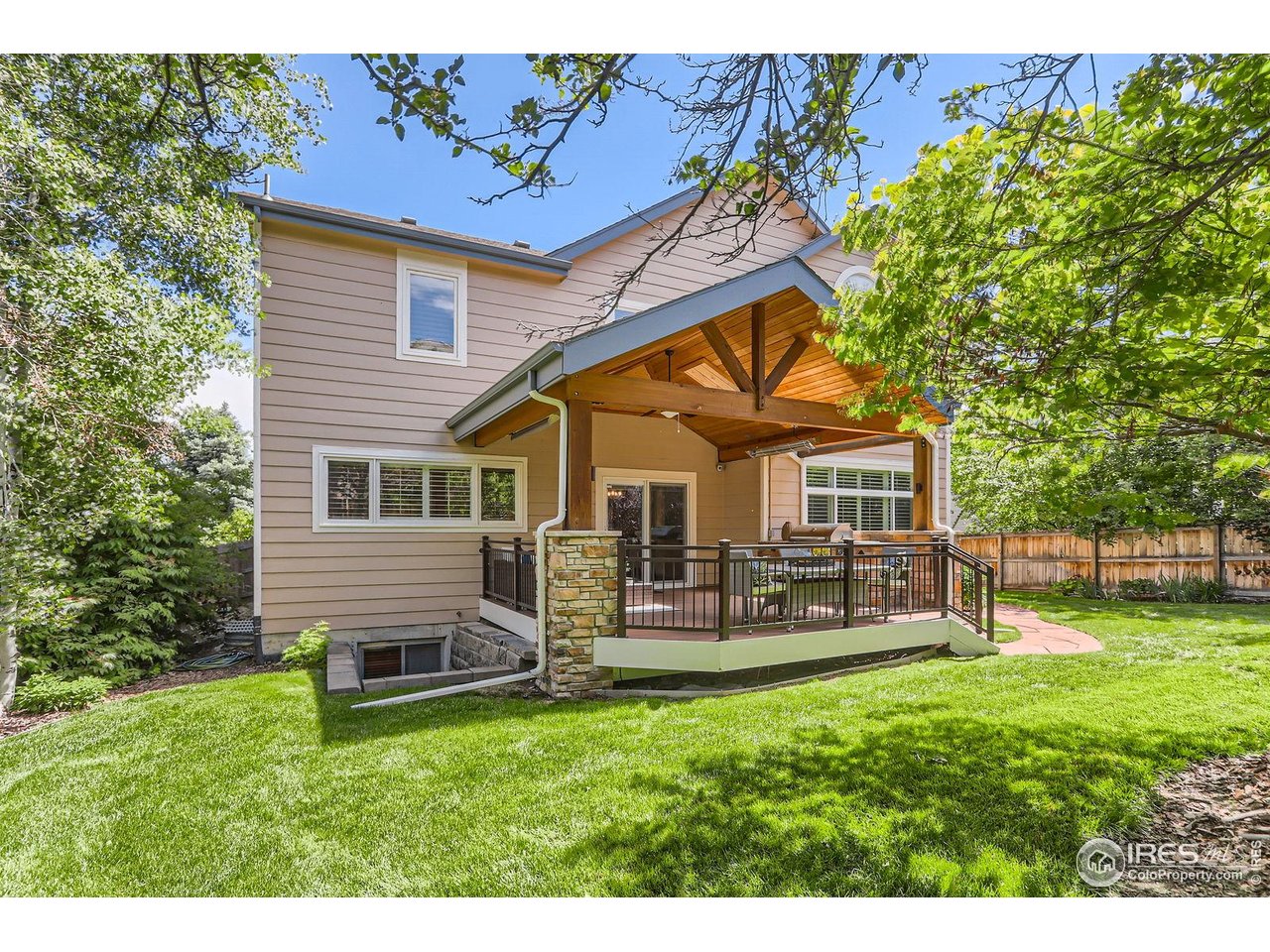1069 Monarch Way Superior, CO 80027 - Photo 37 of 40 a view of a house with a yard porch and sitting area