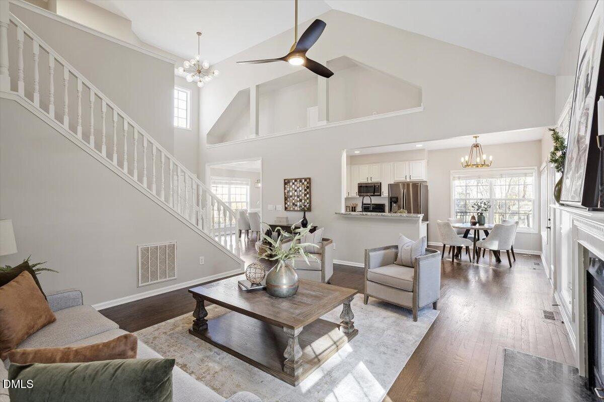 327 Whitney Lane Durham, NC 27713 - Photo 11 of 33 a living room with furniture and wooden floor