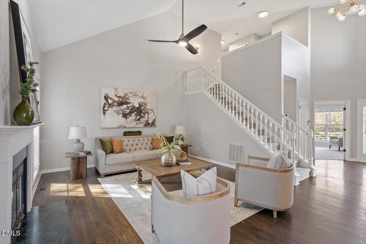 327 Whitney Lane Durham, NC 27713 - Photo 13 of 33 a living room with furniture and a fireplace