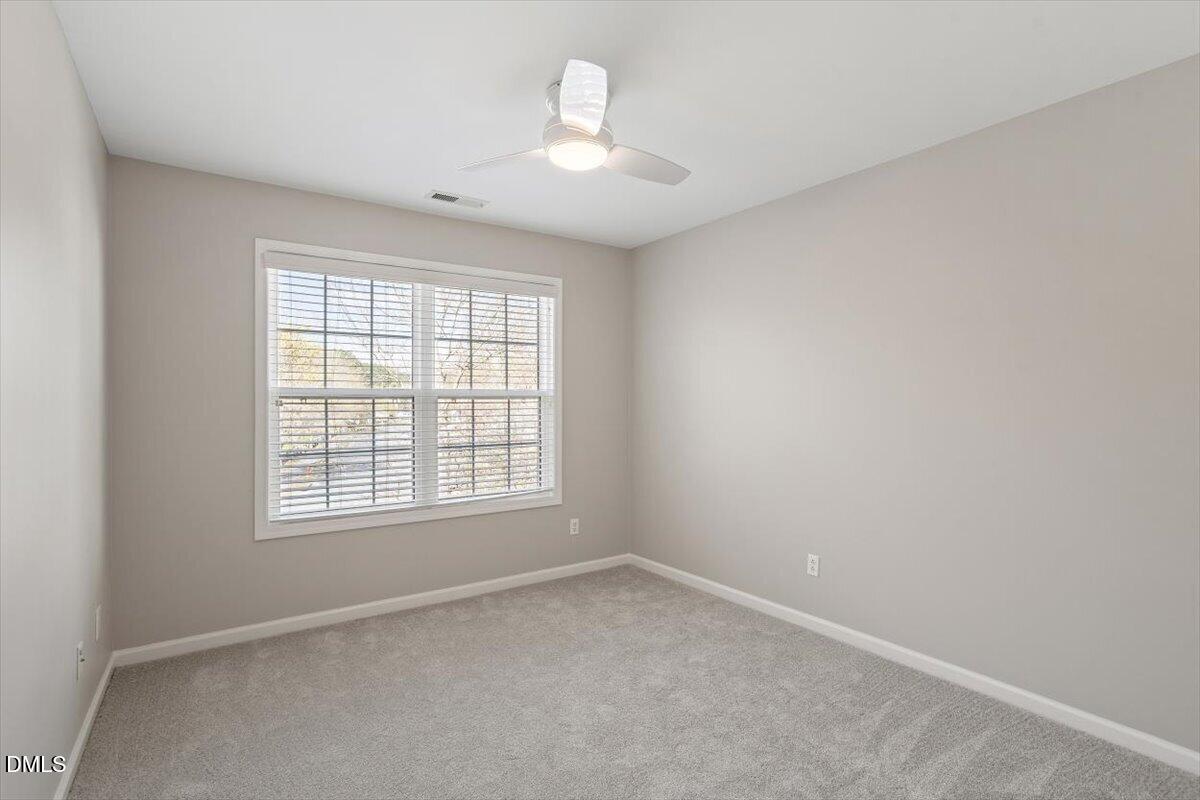 327 Whitney Lane Durham, NC 27713 - Photo 21 of 33 an empty room with a window