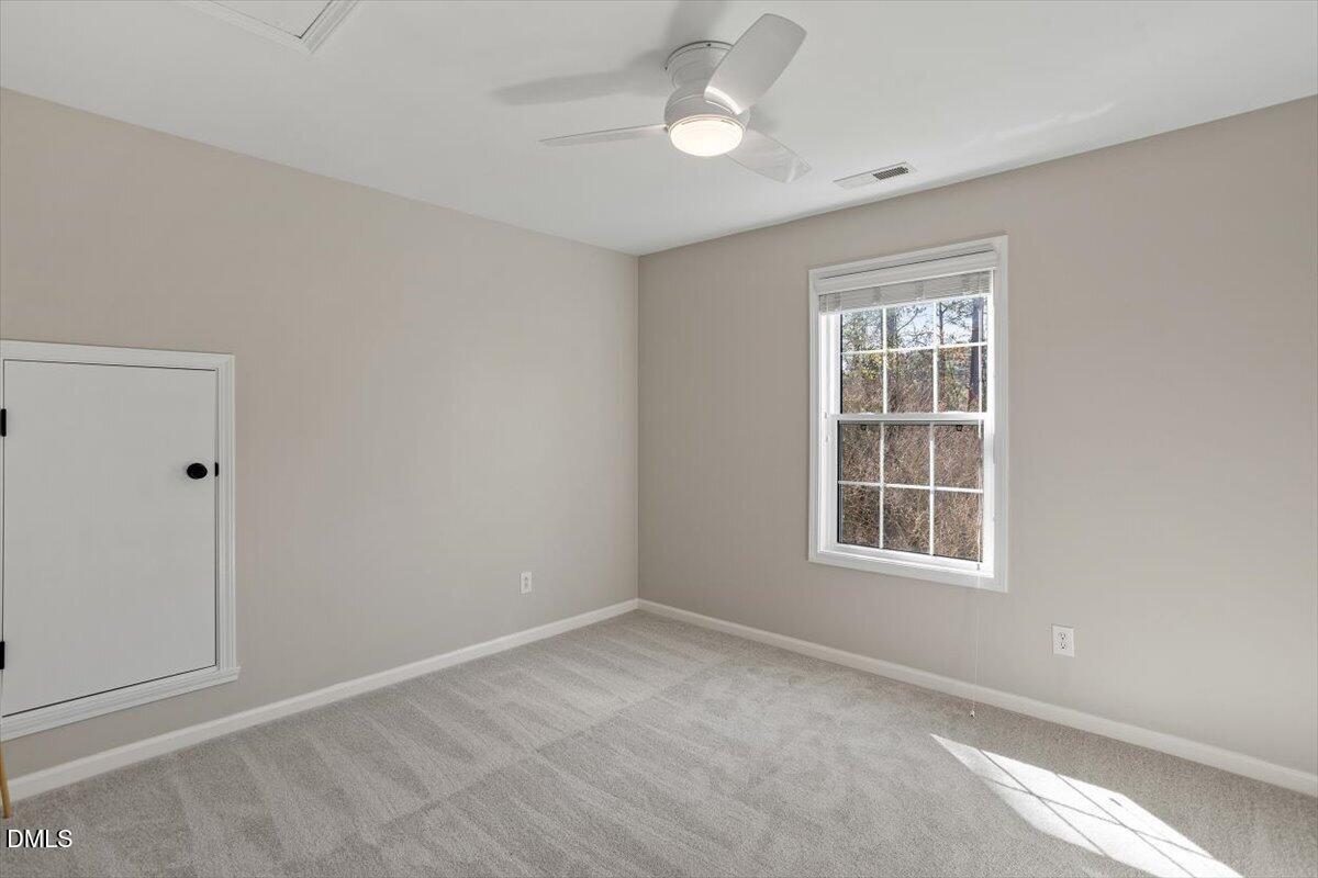 327 Whitney Lane Durham, NC 27713 - Photo 23 of 33 an empty room with windows and closet