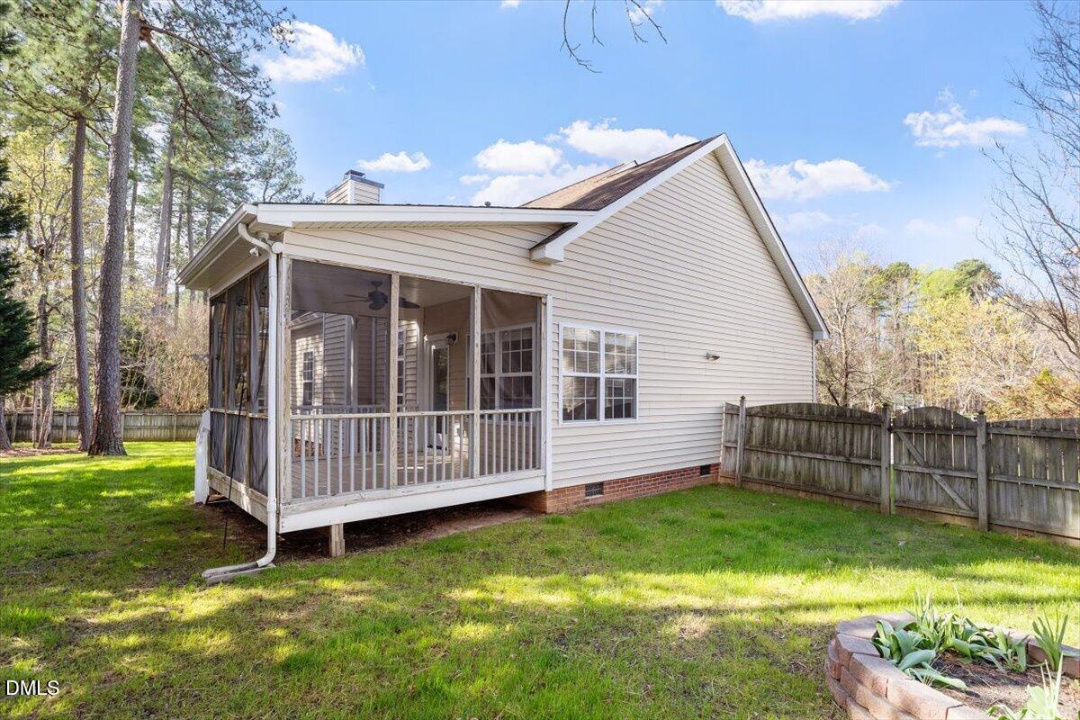 327 Whitney Lane Durham, NC 27713 - Photo 28 of 33 a view of a house with a yard