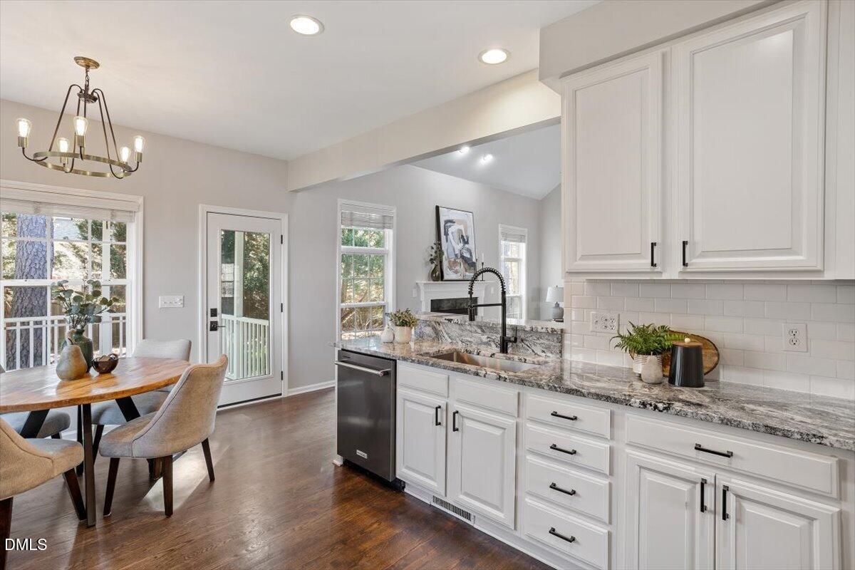 327 Whitney Lane Durham, NC 27713 - Photo 8 of 33 a kitchen with sink and cabinets