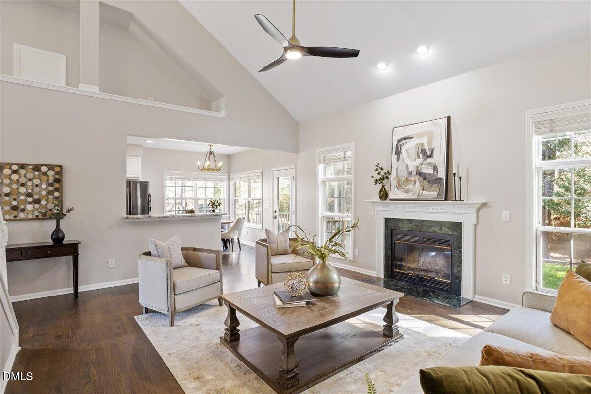 327 Whitney Lane Durham, NC 27713 - Photo 10 of 33 a living room with furniture and a fireplace