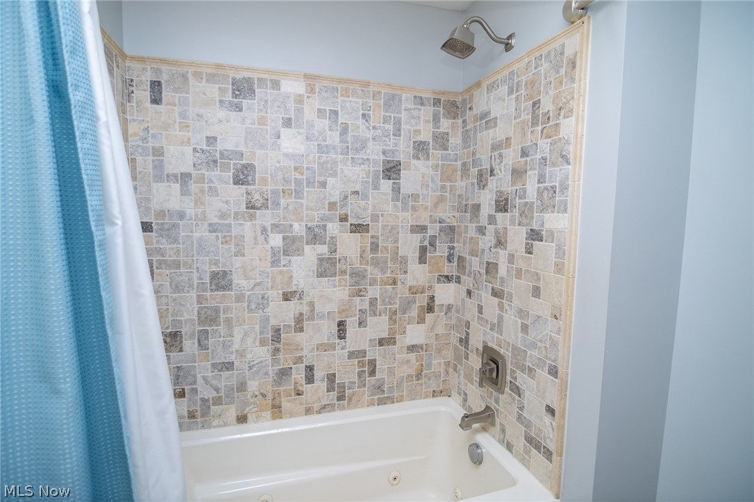 53341 Key Bellaire Road Bellaire, OH 43906 - Photo 16 of 48 Bathroom featuring a combined bath / shower with jetted tub
