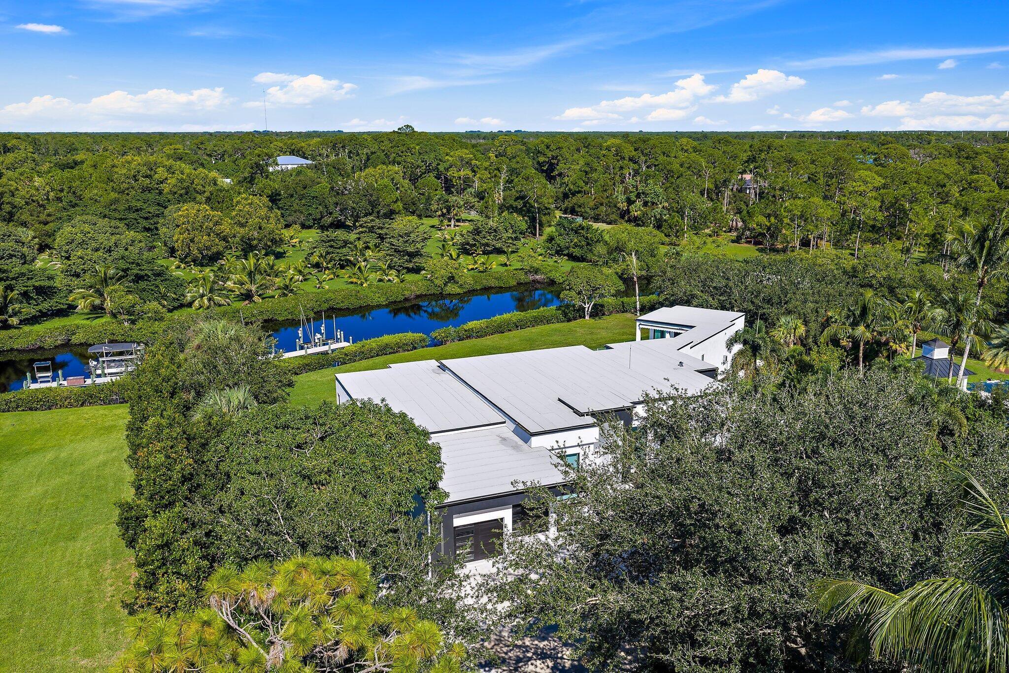 8309 Southeast Rivers Edge Street Jupiter, FL 33458 - Photo 2 of 96 016-8309SERiversEdgeSt-Jupiter-SMALL