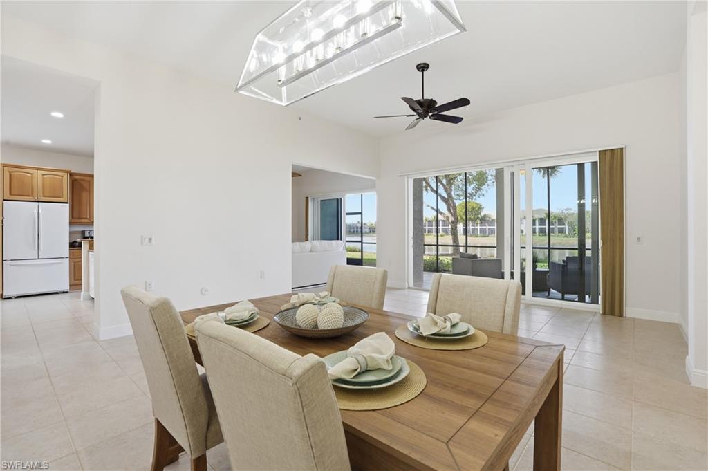 9263 Museo Circle, Unit 103 Naples, FL 34114 - Photo 13 of 49 Dining area with light tile patterned floors, recessed lighting, and ceiling fan