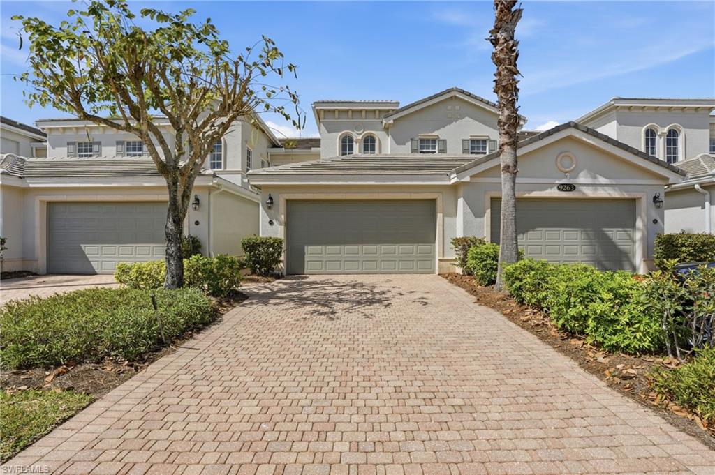 9263 Museo Circle, Unit 103 Naples, FL 34114 - Photo 2 of 49 Mediterranean / spanish home with stucco siding and decorative driveway