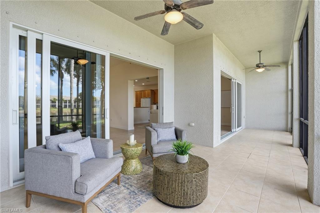 9263 Museo Circle, Unit 103 Naples, FL 34114 - Photo 33 of 49 View of patio / terrace featuring ceiling fan
