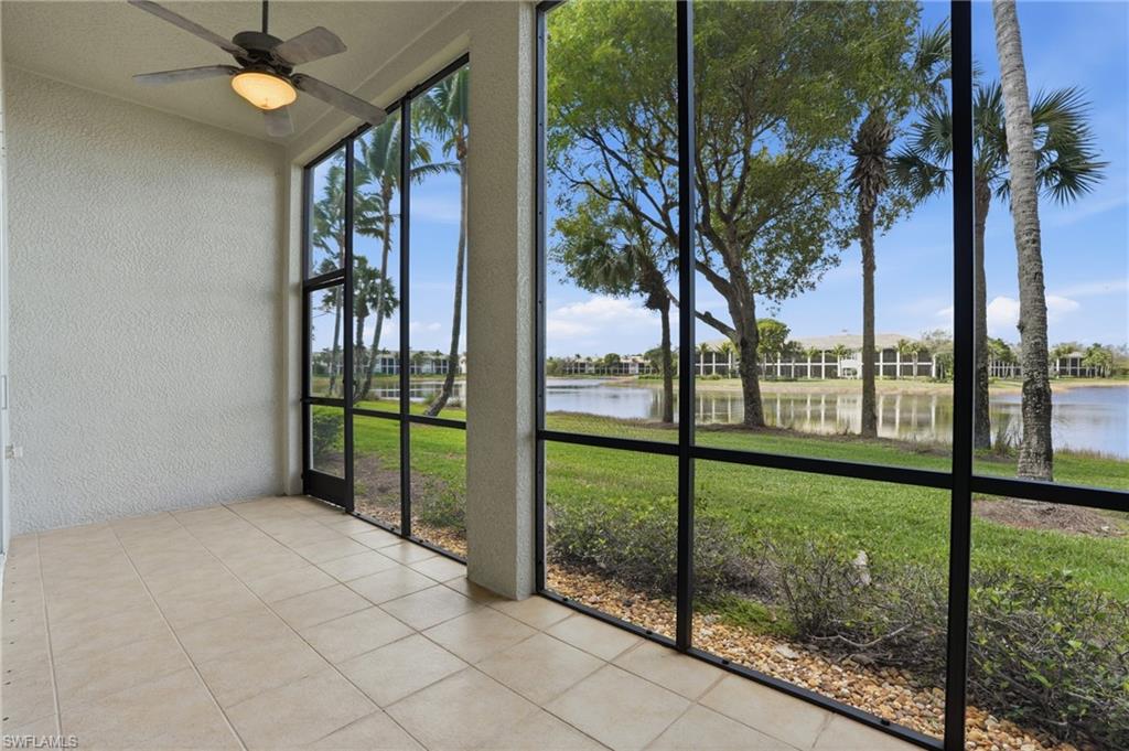 9263 Museo Circle, Unit 103 Naples, FL 34114 - Photo 34 of 49 Unfurnished sunroom with ceiling fan and a water view
