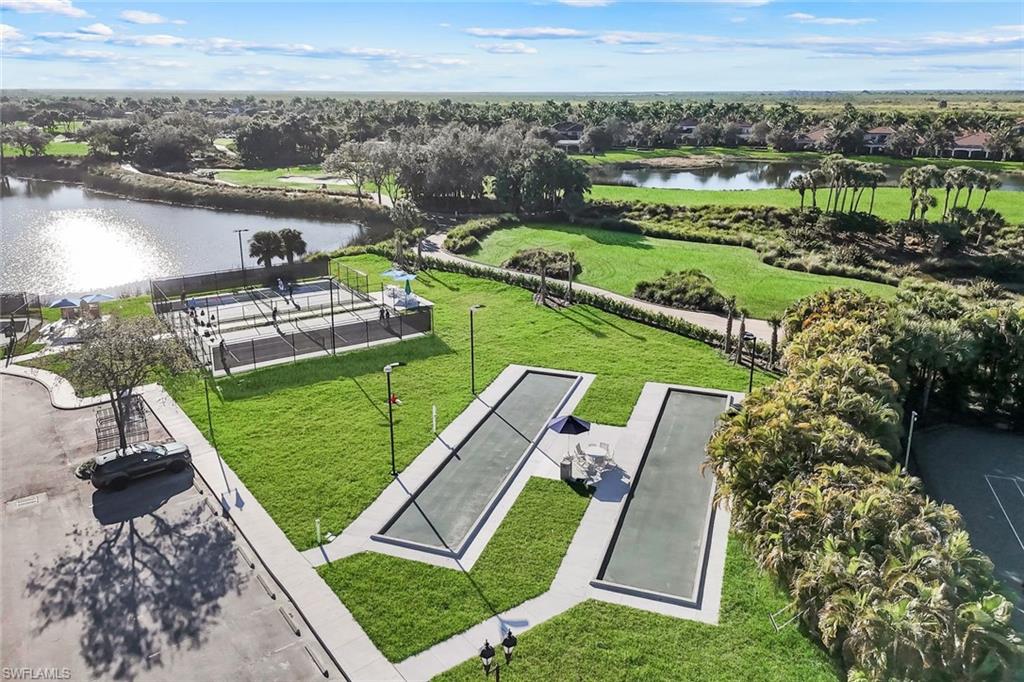 9263 Museo Circle, Unit 103 Naples, FL 34114 - Photo 40 of 49 Aerial perspective of Bocce Ball area