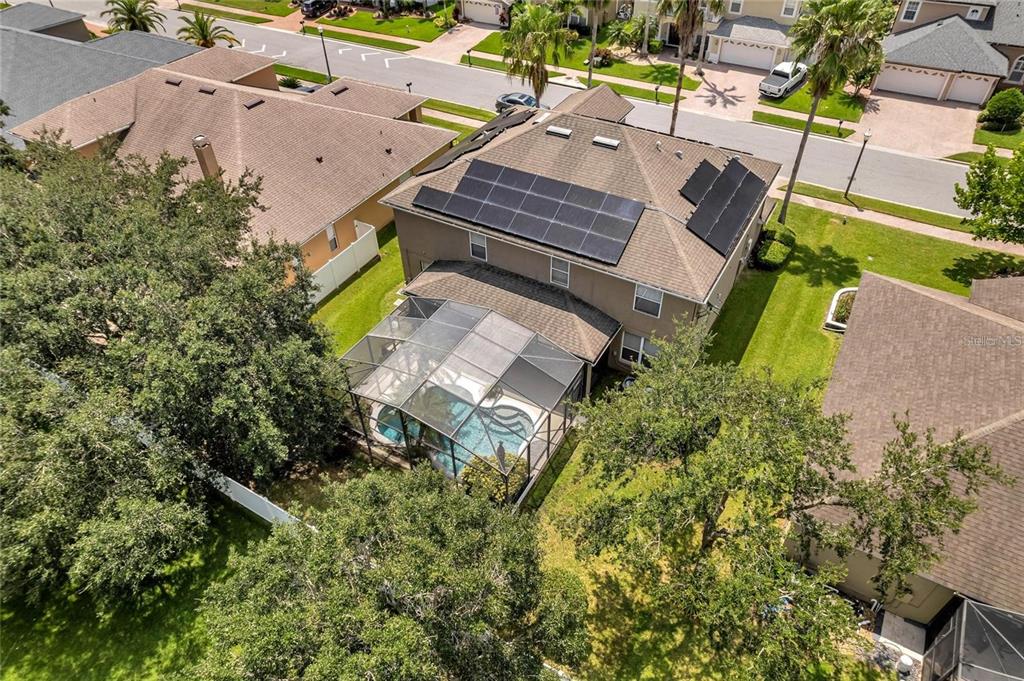 10023 Ians Ridge Road Orlando, FL 32832 - Photo 53 of 60 an aerial view of a house with a garden
