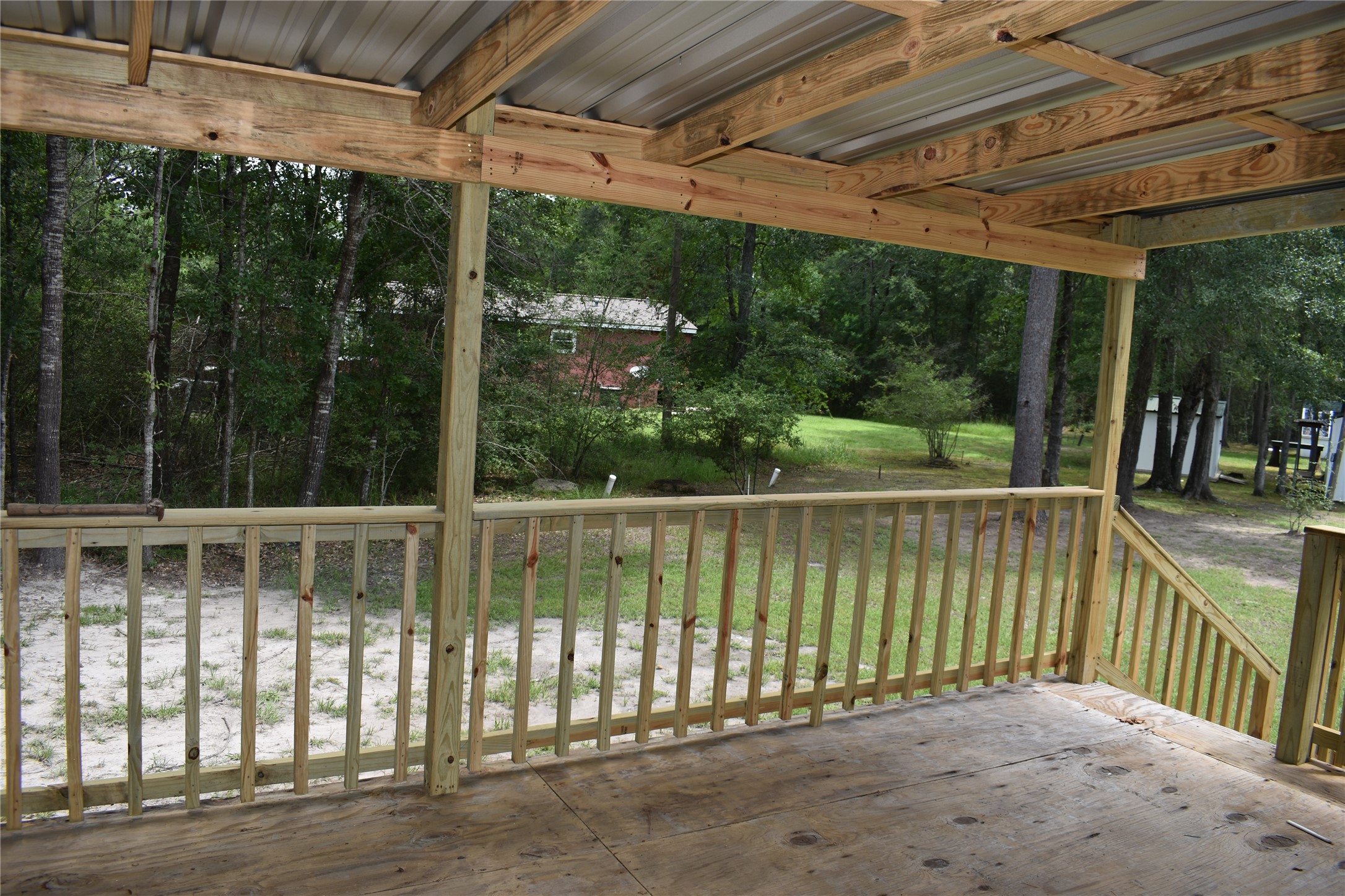 25 Wood Glen Trinity, TX 75862 - Photo 23 of 25 Brand new back porch