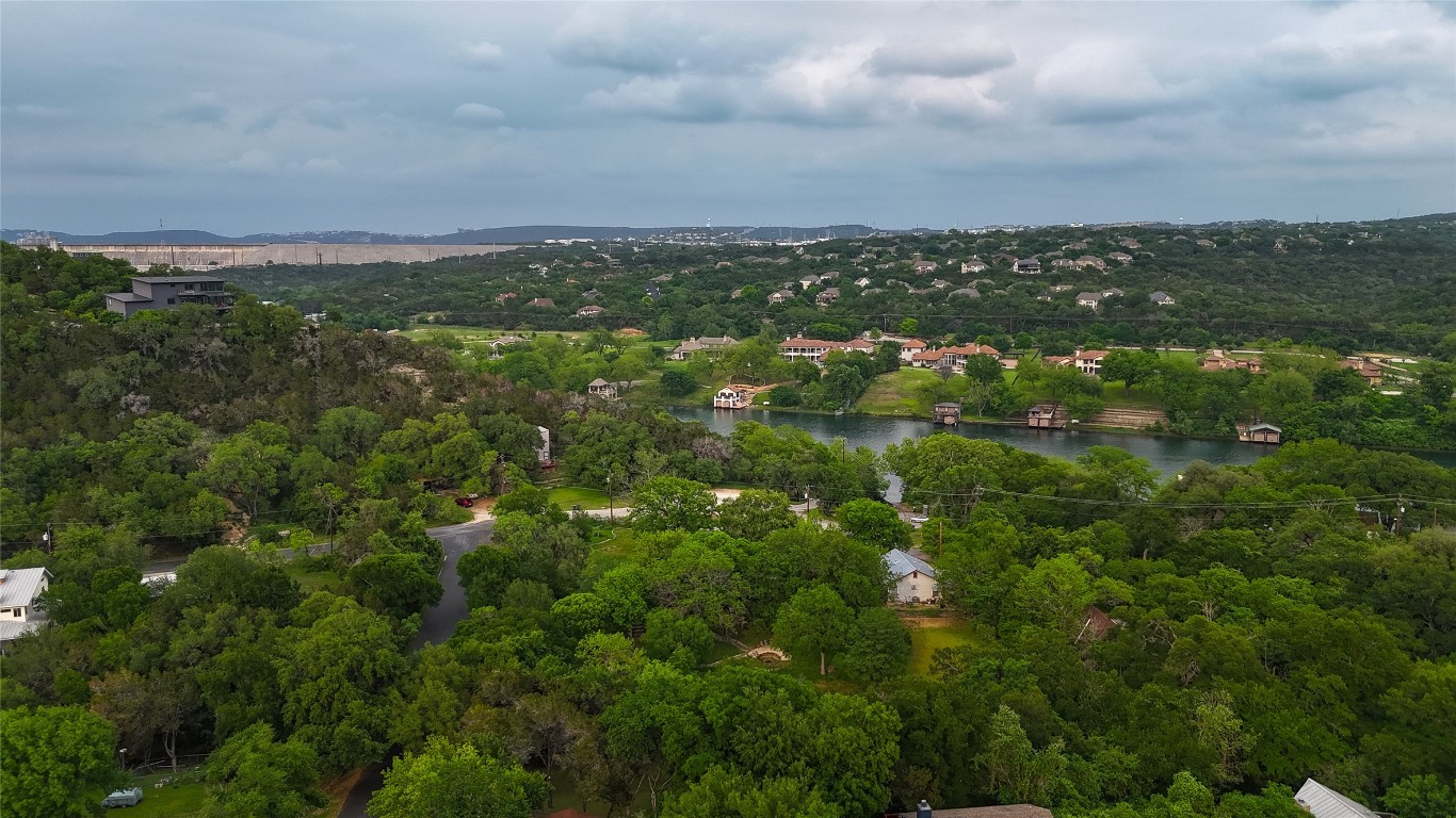 14013 Running Deer Trail Austin, TX 78734 - Photo 18 of 22 a view of a city with lush green forest