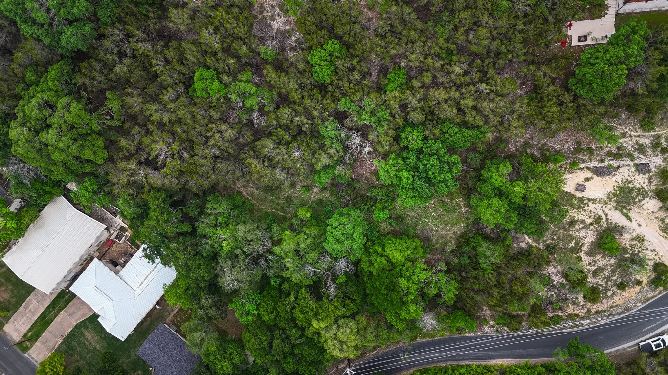 14013 Running Deer Trail Austin, TX 78734 - Photo 2 of 22 an outdoor view of house with yard