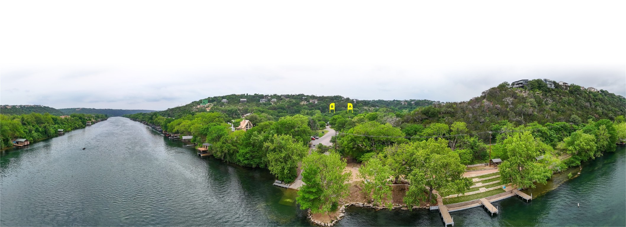 14013 Running Deer Trail Austin, TX 78734 - Photo 3 of 22 an aerial view of a house with a yard and lake view