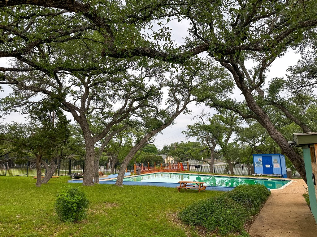14013 Running Deer Trail Austin, TX 78734 - Photo 8 of 22 a view of a park with large trees