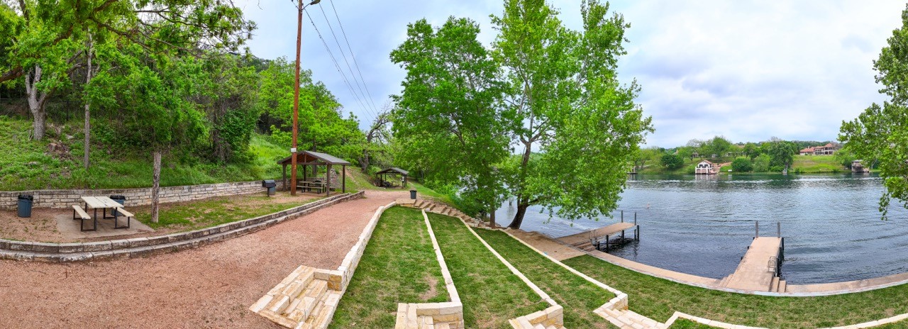 14013 Running Deer Trail Austin, TX 78734 - Photo 9 of 22 a view of a fountain in the backyard of a house