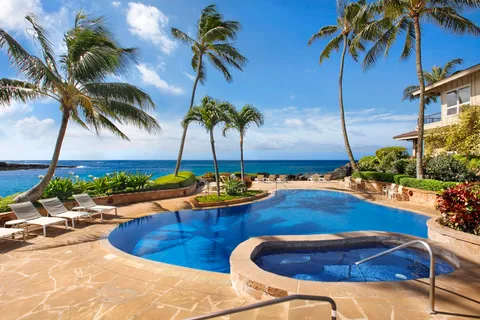 a view of swimming pool with a patio
