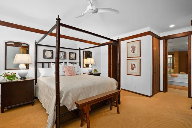 a bed room with a bed and a window