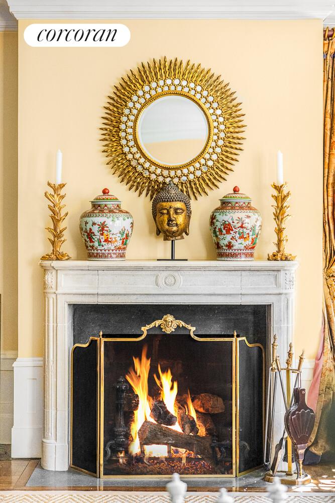 875 Park Avenue, Unit 8D9D Manhattan, NY 10075 - Photo 10 of 26 a close view of a fireplace with a mirror