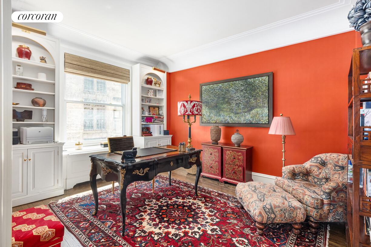 875 Park Avenue, Unit 8D9D Manhattan, NY 10075 - Photo 12 of 26 a view of a workspace with furniture and a window