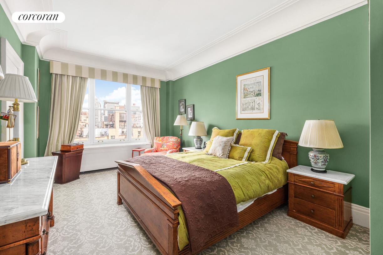 875 Park Avenue, Unit 8D9D Manhattan, NY 10075 - Photo 13 of 26 a bed room with a bed and a couch