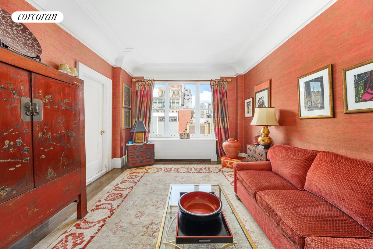 875 Park Avenue, Unit 8D9D Manhattan, NY 10075 - Photo 15 of 26 a living room with furniture and a rug