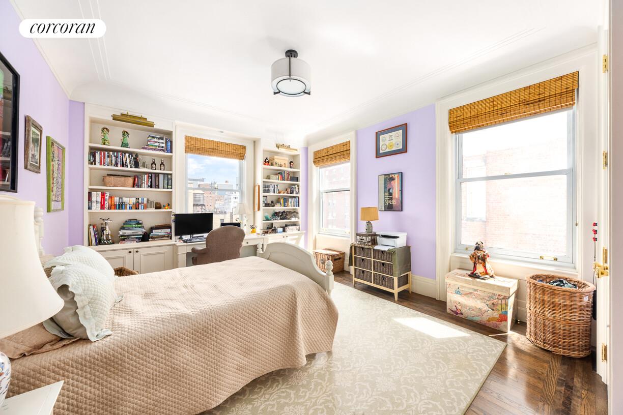 875 Park Avenue, Unit 8D9D Manhattan, NY 10075 - Photo 18 of 26 a bedroom with a bed wooden floor and a large window