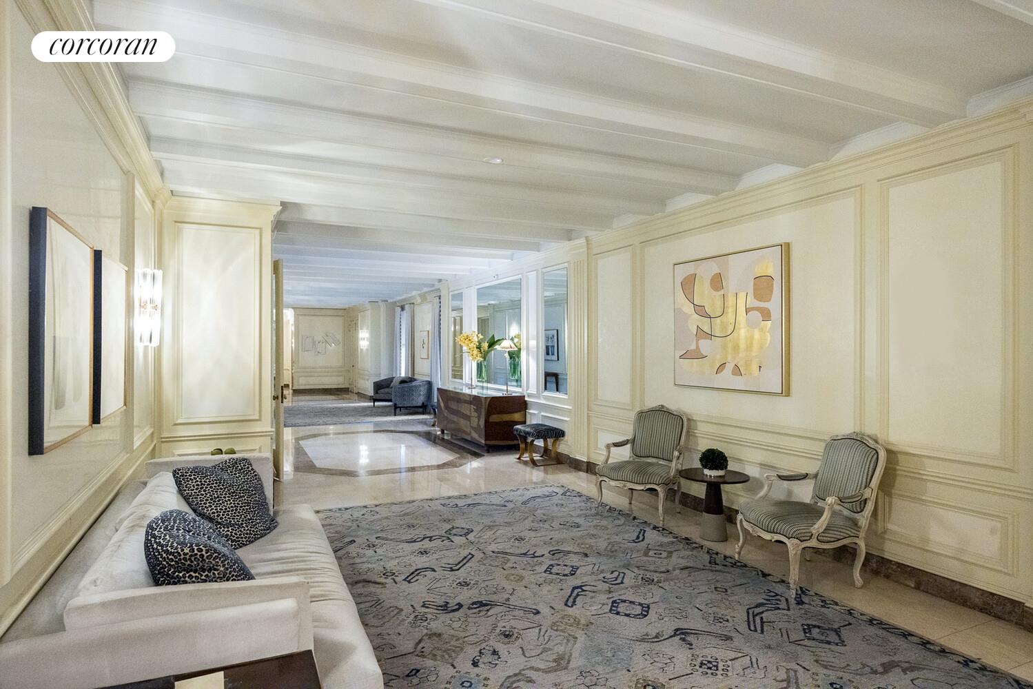 875 Park Avenue, Unit 8D9D Manhattan, NY 10075 - Photo 23 of 26 a living room with furniture and a couch