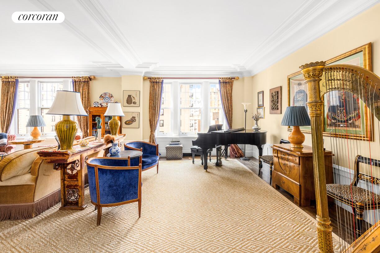 875 Park Avenue, Unit 8D9D Manhattan, NY 10075 - Photo 3 of 26 a living room with furniture stove and a window