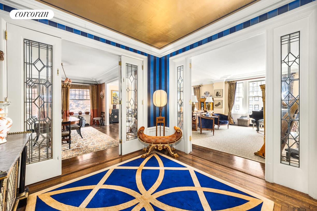 875 Park Avenue, Unit 8D9D Manhattan, NY 10075 - Photo 4 of 26 a room with lots of furniture and a rug