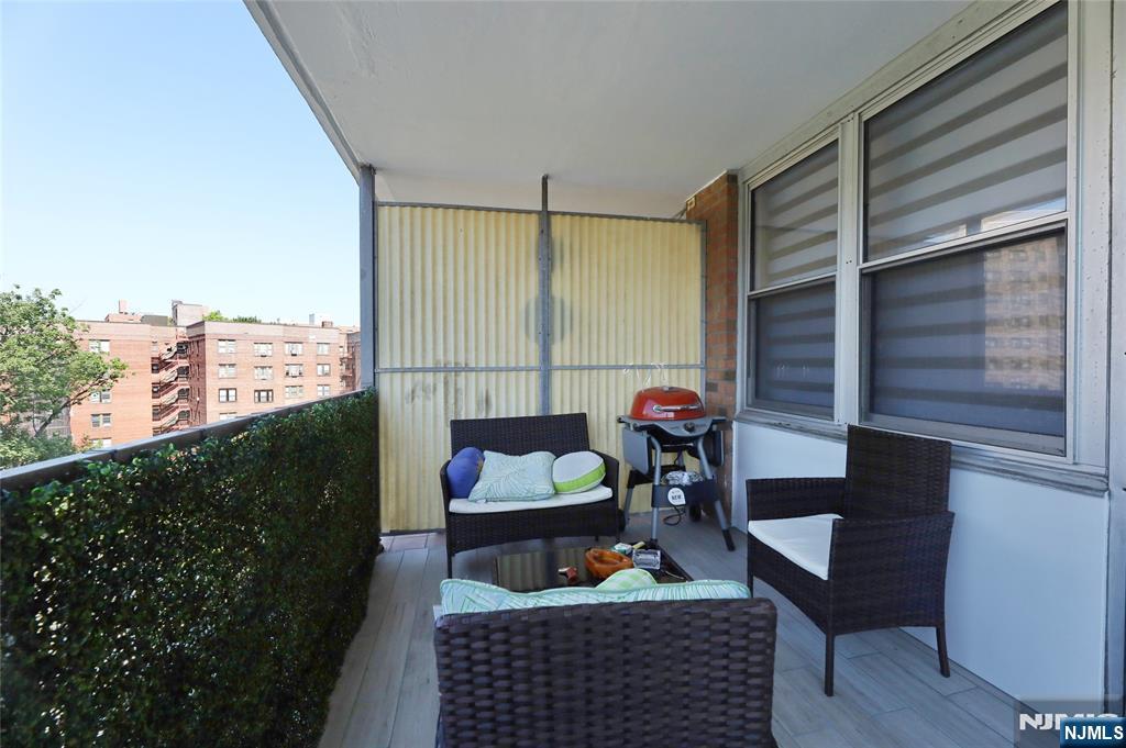 301 Beech Street, Unit 7A Hackensack, NJ 07601 - Photo 17 of 19 a outdoor living space with furniture and a potted plant