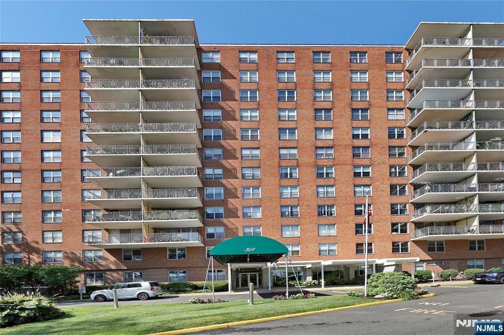 301 Beech Street, Unit 7A Hackensack, NJ 07601 - Photo 2 of 19 a view of a building with a yard