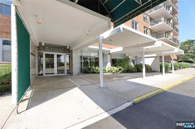 a view of a building with a street