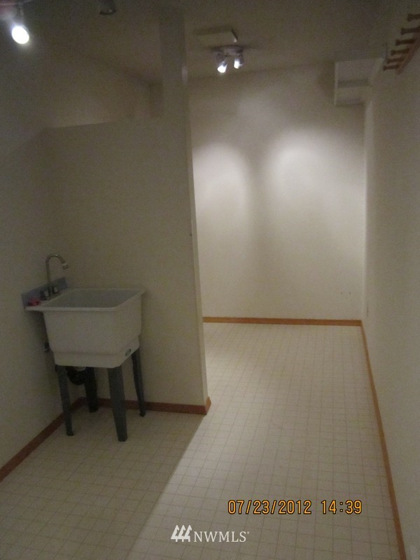 22005 Old Owen Road Monroe, WA 98272 - Photo 3 of 11 a bathroom with a sink toilet and a mirror