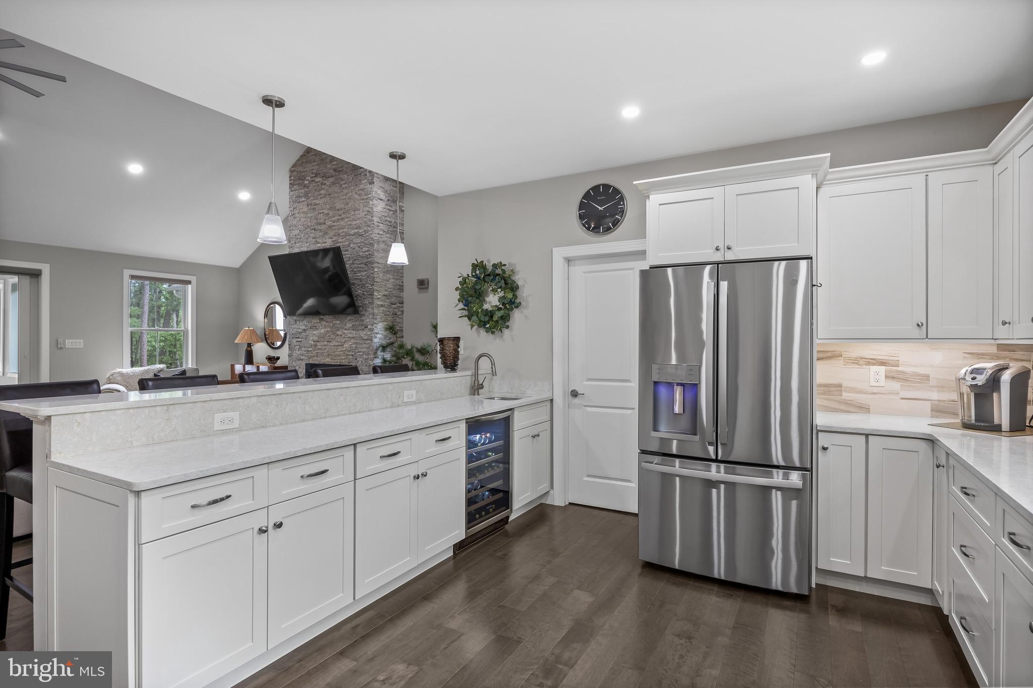 15 Sawmill Road Medford, NJ 08055 - Photo 17 of 49 a kitchen with white cabinets and stainless steel appliances