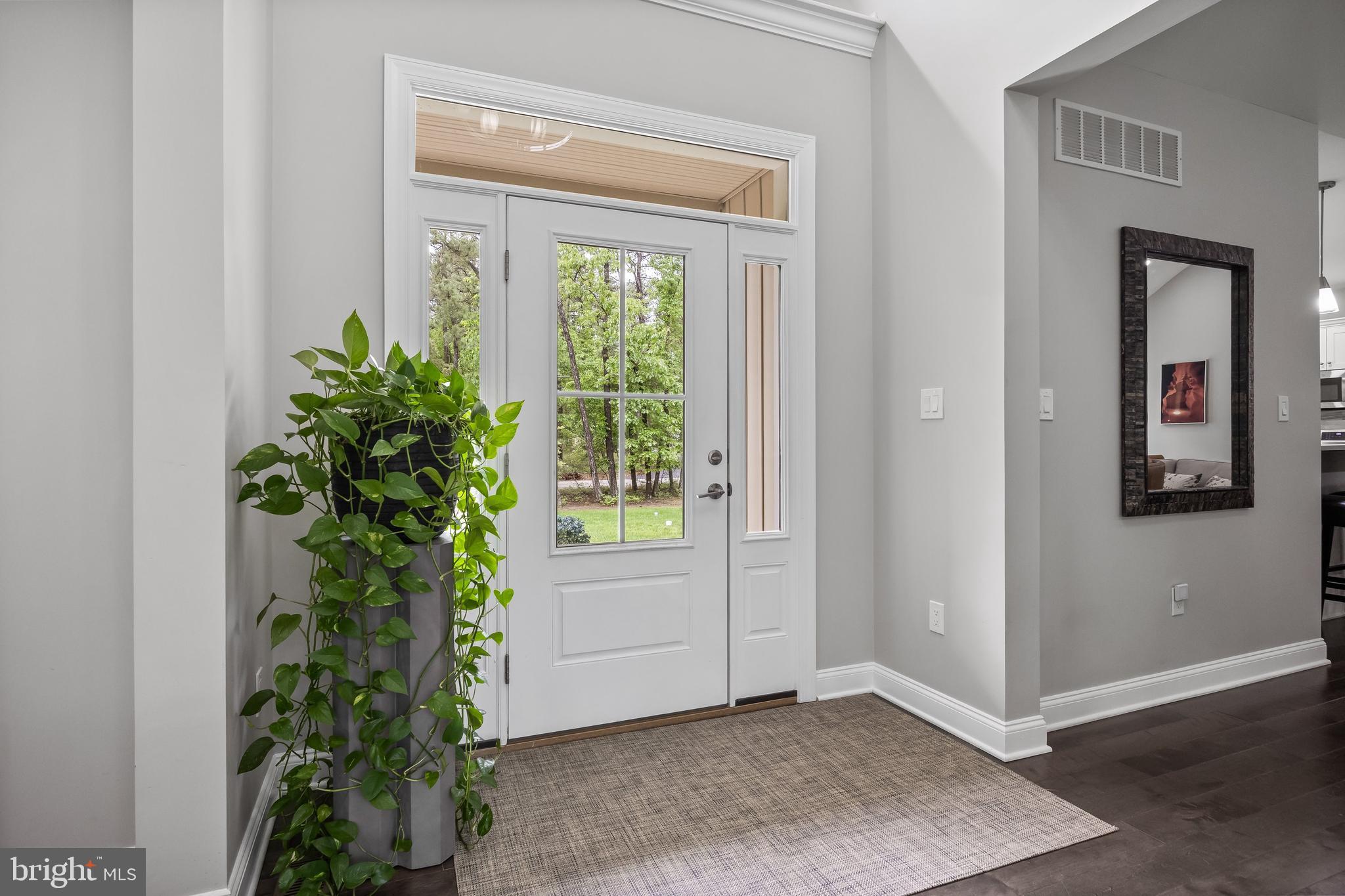 15 Sawmill Road Medford, NJ 08055 - Photo 6 of 49 a view of entryway with window and front door