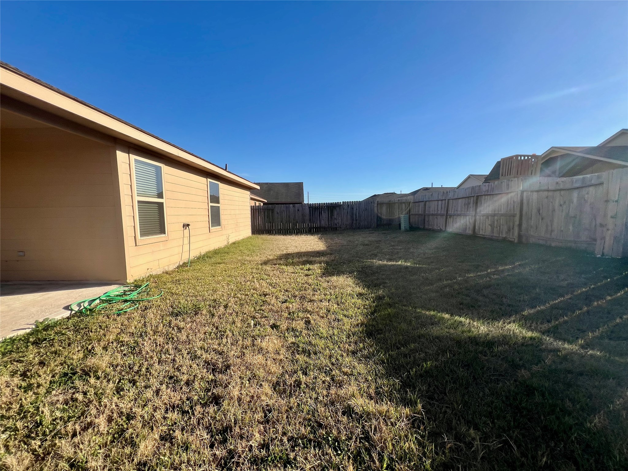 6015 Lilly Belle Street Katy, TX 77449 - Photo 9 of 10 a view of a backyard of the house