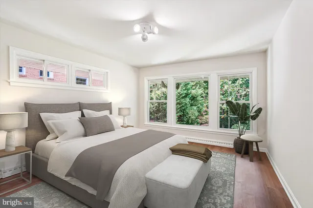 a bathroom with a sink vanity tub and a shower