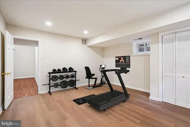 a kitchen with granite countertop cabinets stainless steel appliances and a sink