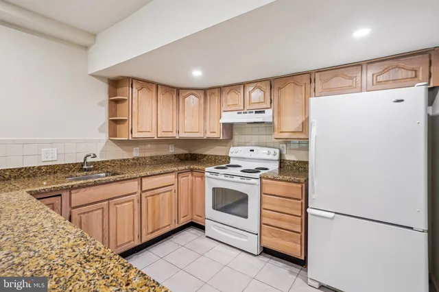 a view of a brick house with a large window