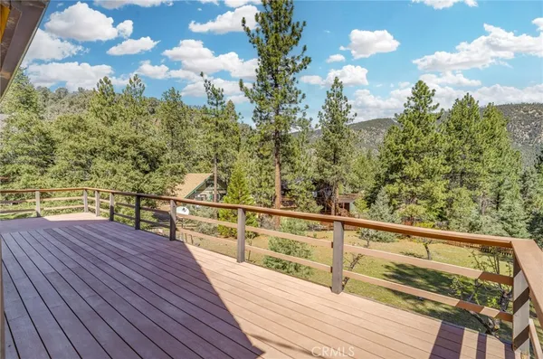 an aerial view of a houses with outdoor space