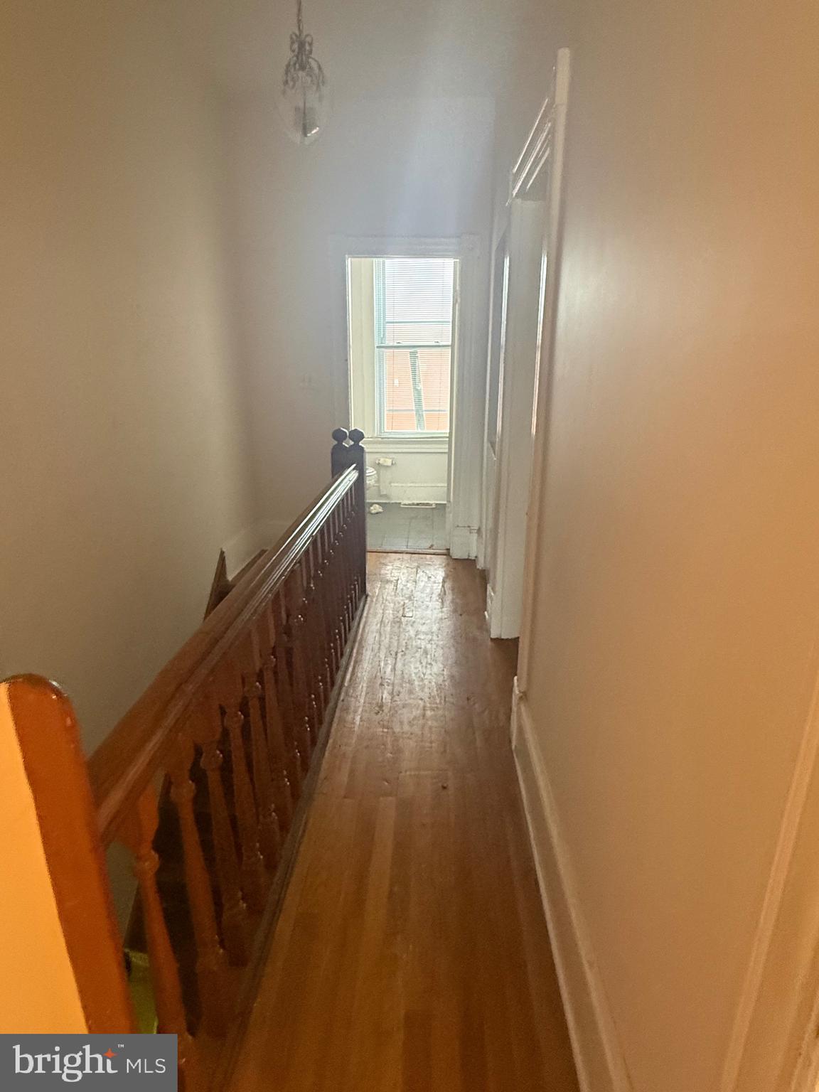 656 6th Street Northeast Washington, DC 20002 - Photo 19 of 30 a view of a hallway with wooden floor and staircase
