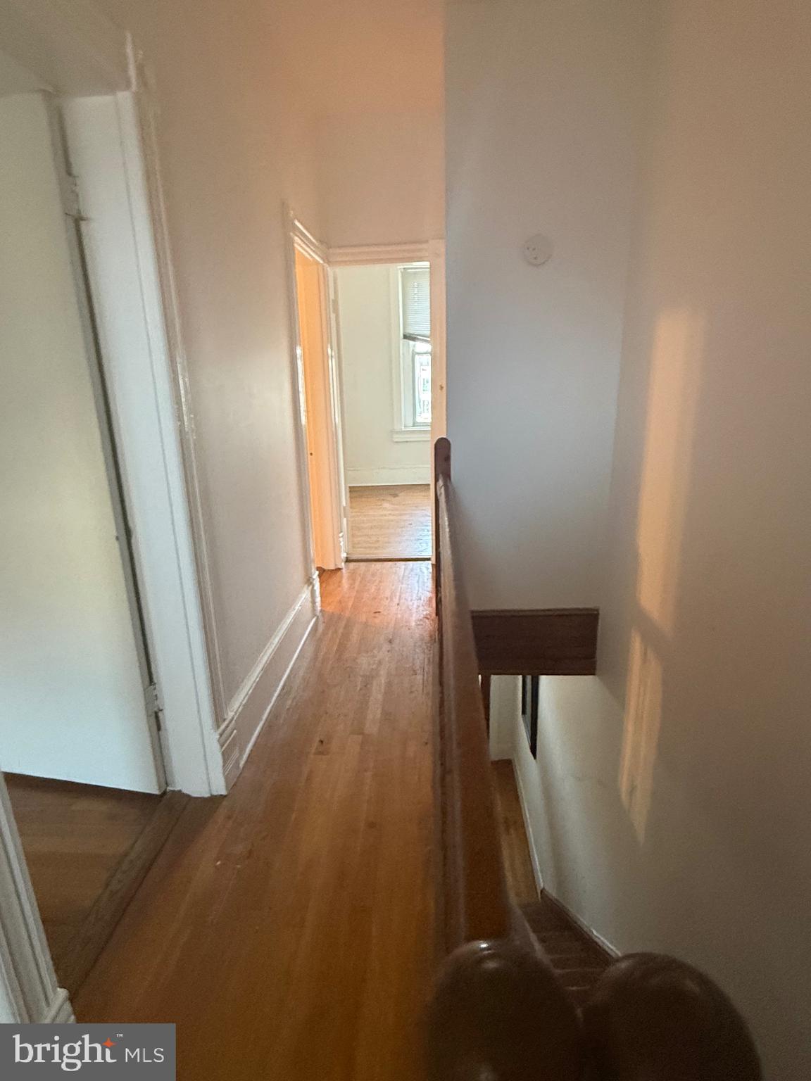 656 6th Street Northeast Washington, DC 20002 - Photo 10 of 30 a view of a hallway with wooden floor and staircase