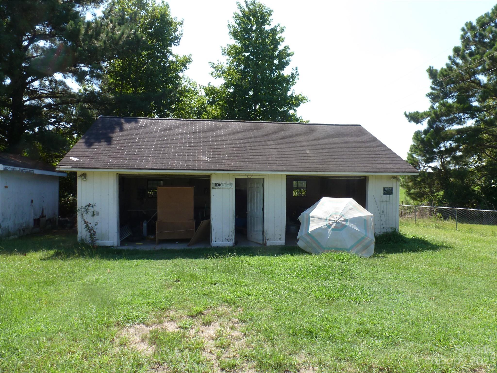 2804 Regency Road Lancaster, SC 29720 - Photo 4 of 8 a front view of house with garden and trees